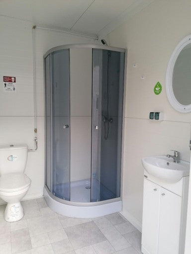 pabellón de aseo contenedor sanitario ducha